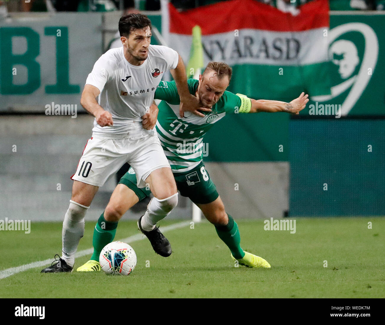 BUDAPEST, HUNGARY - JULY 24: Davide Lanzafame of Ferencvarosi TC #10  celebrates his goal among Tokmac Chol Nguen of Ferencvarosi TC #93, Ihor  Kharatin of Ferencvarosi TC (l2), Gergo Lovrencsics of Ferencvarosi