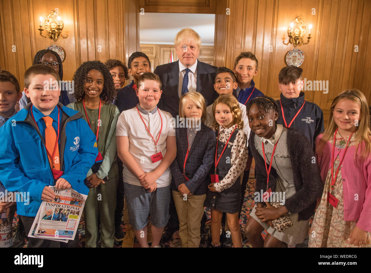 EMBARGOED TO 1800 FRIDAY AUGUST 30 Prime Minister Boris Johnson stands