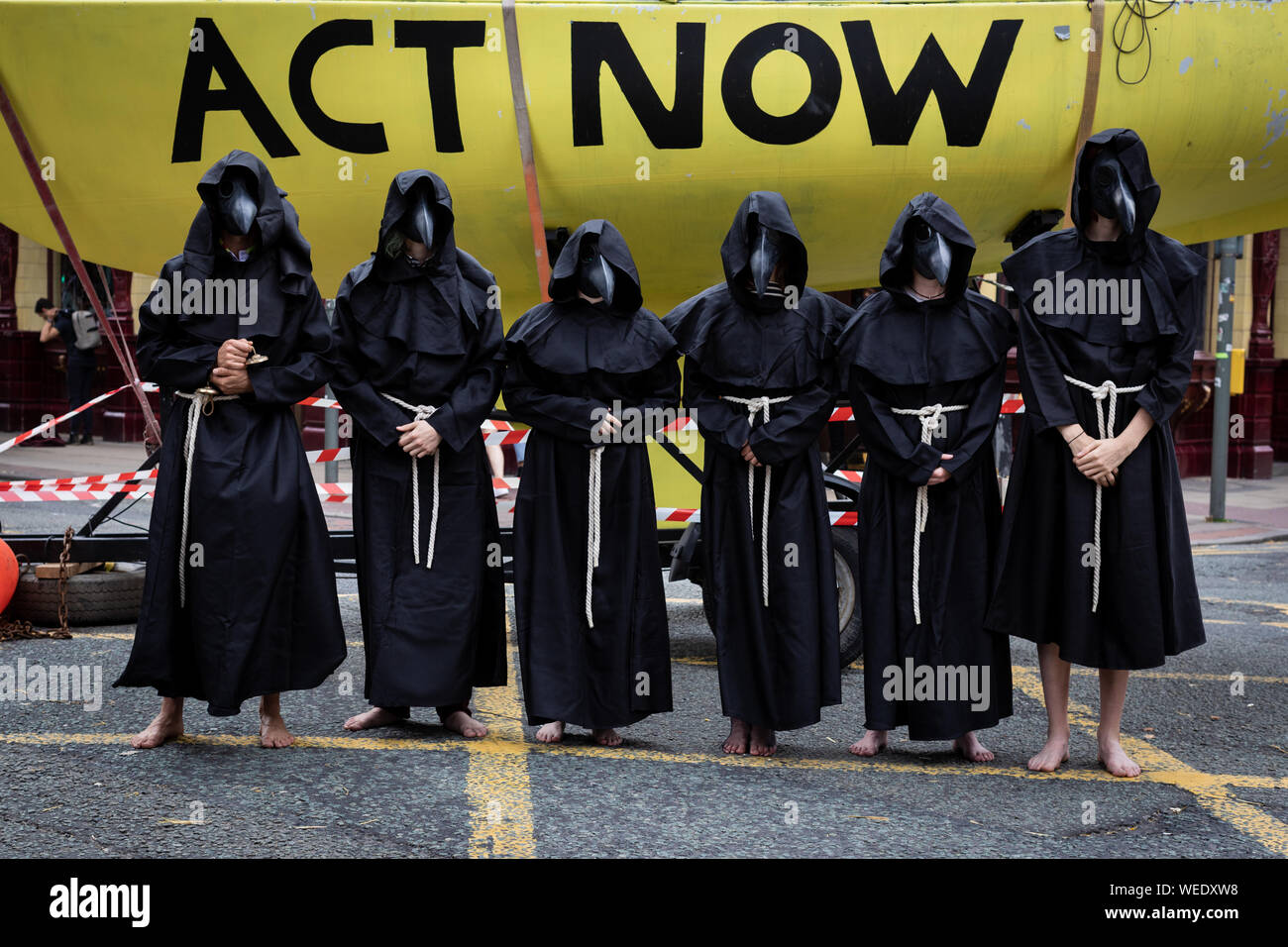 Manchester, UK. 30th Aug, 2019. The Extinction Rebellion movement occupied one of the major transport routes through the city this morning. Deansgate, came to a standstill as protesters and a boat blocked the streets in pursuit for peaceful action to create changes needed to overcome climate change. Credit: Andy Barton/Alamy Live News Stock Photo