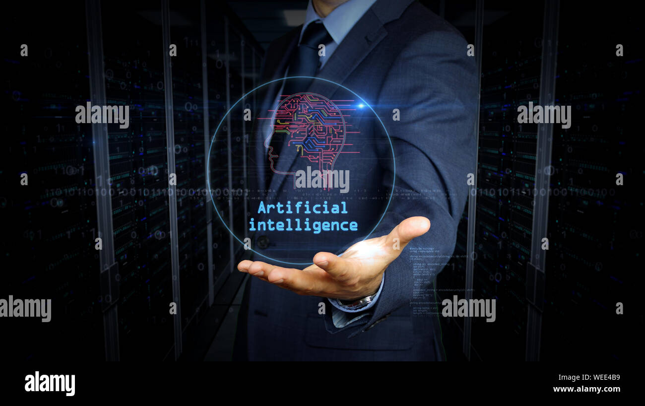 A businessman in a suit touch the screen with artificial intelligence hologram. Man using hand on virtual display interface. Cybernetic brain, deep le Stock Photo
