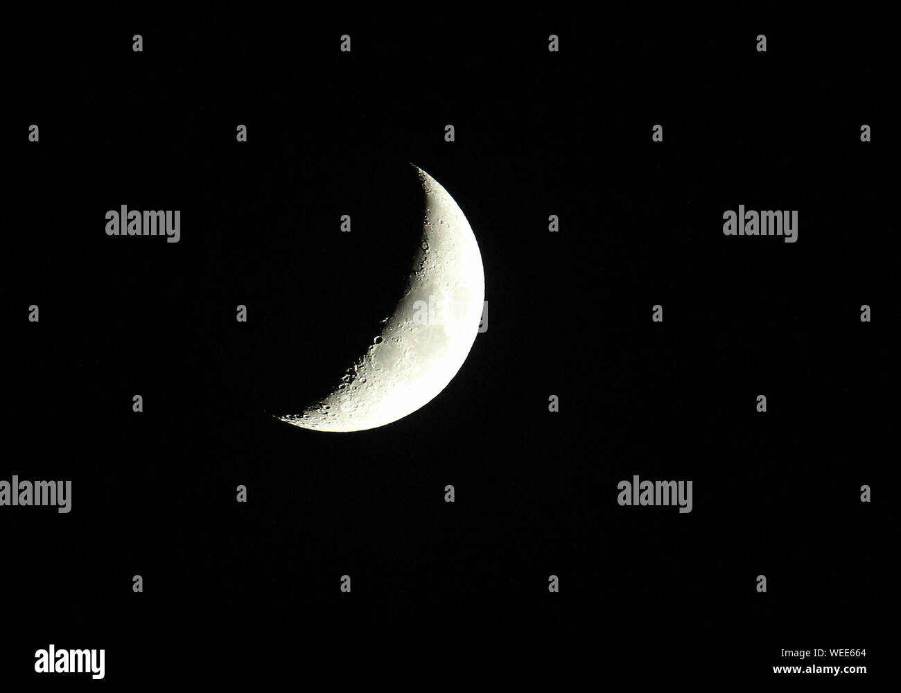 Sliver of moon Stock Photo