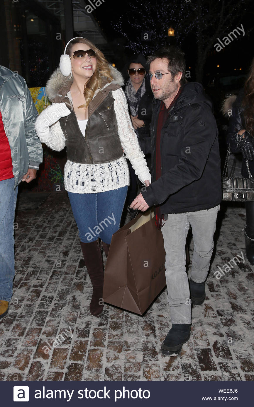 Aspen, CO - Mariah Carey finishes her last minute Christmas shopping with a  visit to the 'Louis Vuitton' store in Aspen, Colorado. Mariah looked cute  and snuggly in a pair of white