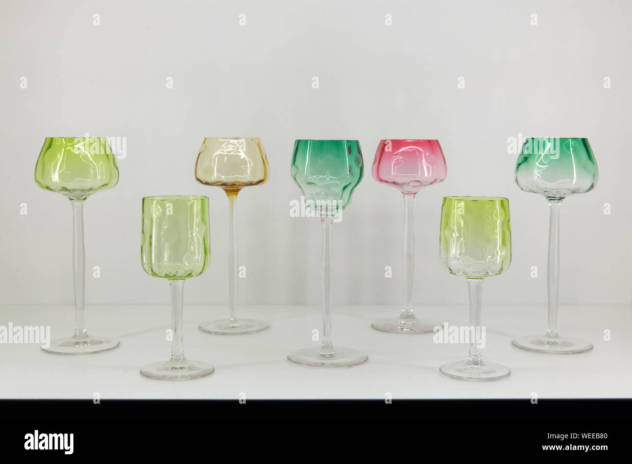 Stem glasses from the dinner set 'Meteor No. 100' designed by Austrian modernist artist Koloman Moser for E. Bakalowits Söhne (1899) on display in the Leopold Museum in Vienna, Austria. Stock Photo