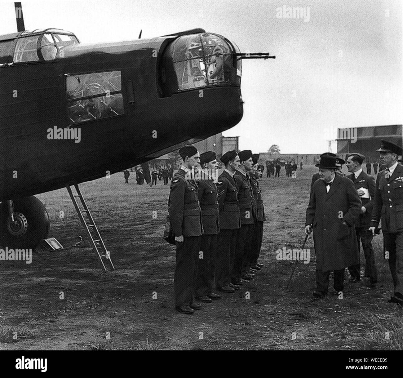 Winston Churchill inspects the aircrew of a Wellington heavy bomber. June1941 Stock Photo