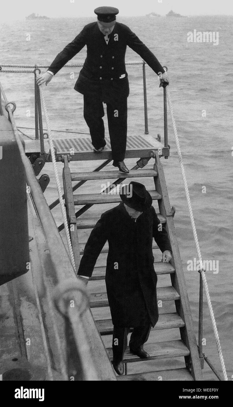 Winston Churchill disembarking HMS Prince of Wales on visit to Newfoundland for meeting with President Roosevelt. August 1941.With Lord Beaverbrook Stock Photo