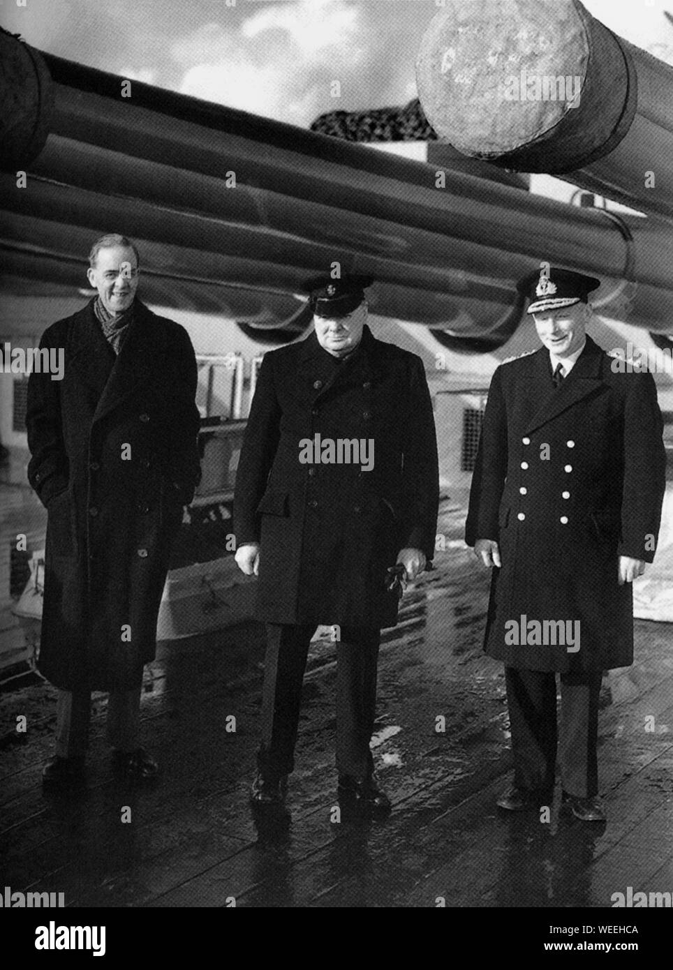 Winston Churchill aboard a warship with Sir Stafford Cripps and Commander of the Home Fleet, Admiral Tovey. 3rd October 1942 Stock Photo