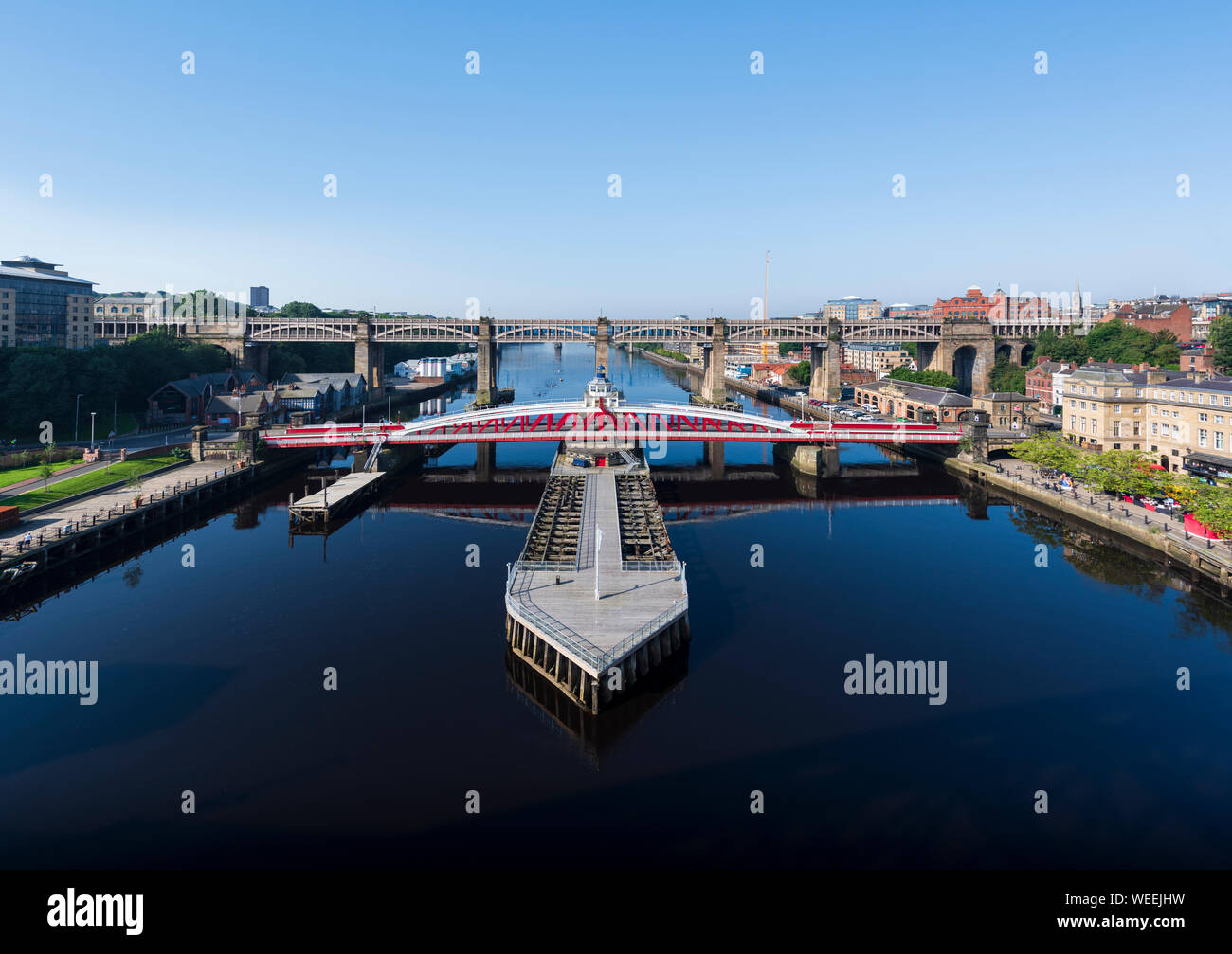 The swingbridge over the river Tyne.  One of several bridges crossing between Gateshead and Newcastle upon Tyne this is the only swing bridge. Stock Photo