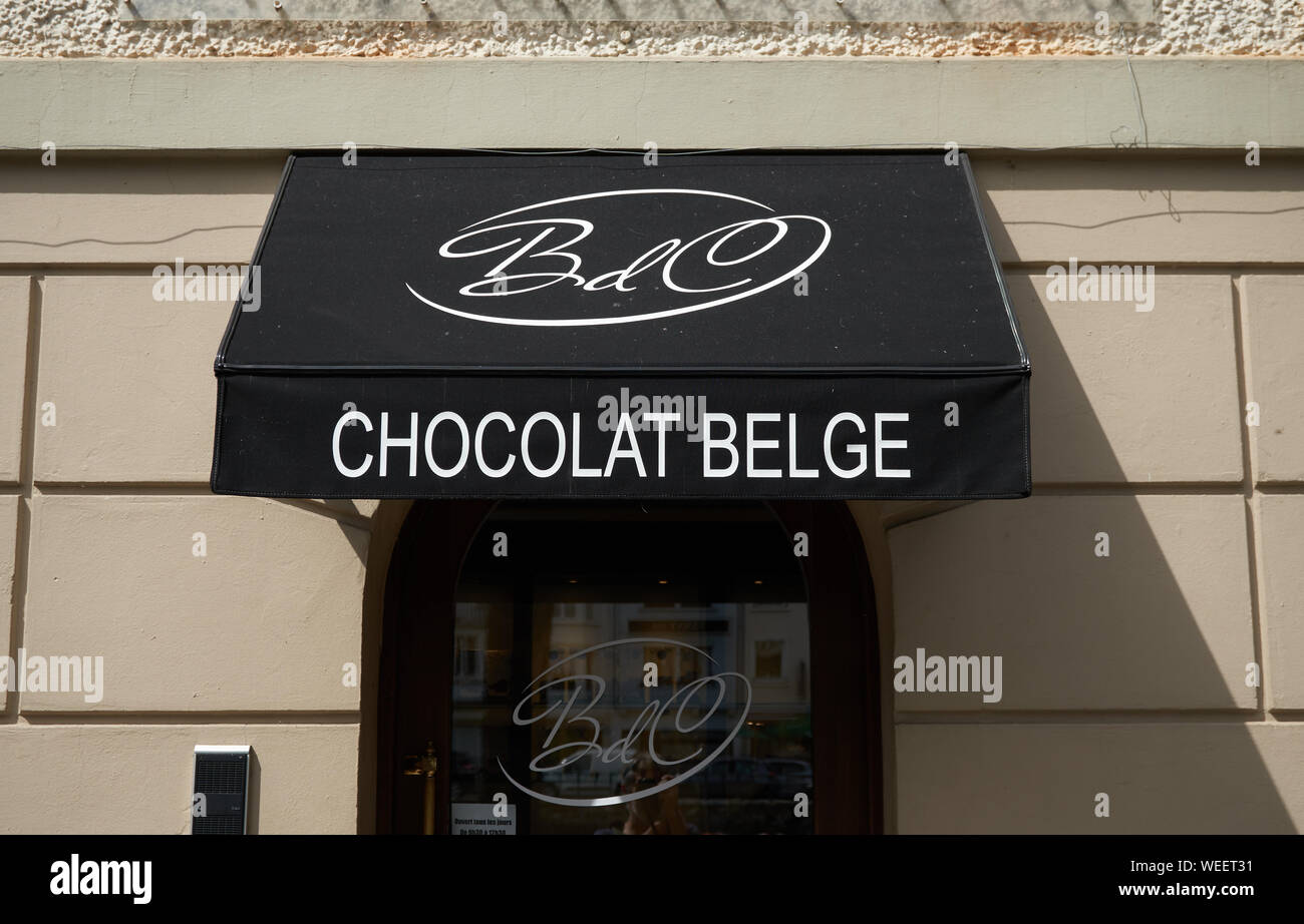 Shop front advertising Belgium Chocolate. Bouillon. Belgium Stock Photo