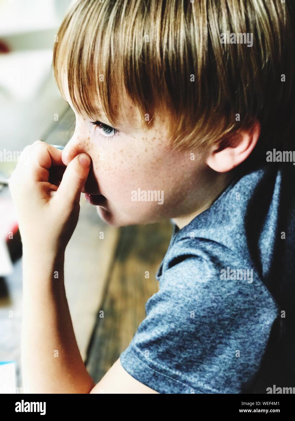 Holding nose hires stock photography and images Alamy