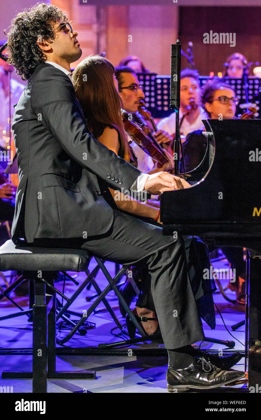 Florence, Italy. 29th Aug 2019. The second night of the New Generation  Festival - Young virtuoso Giuseppe Guarrera (pictured) performs Beethoven's  magnificent Piano Concerto no. 4 under the baton of Maestro Maximilian