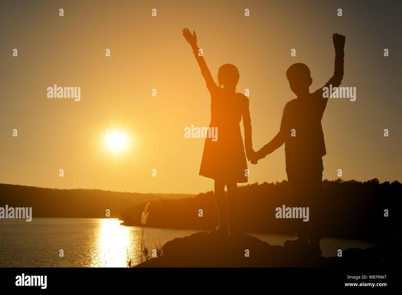 Two friends holding hands hi-res stock photography and images - Alamy