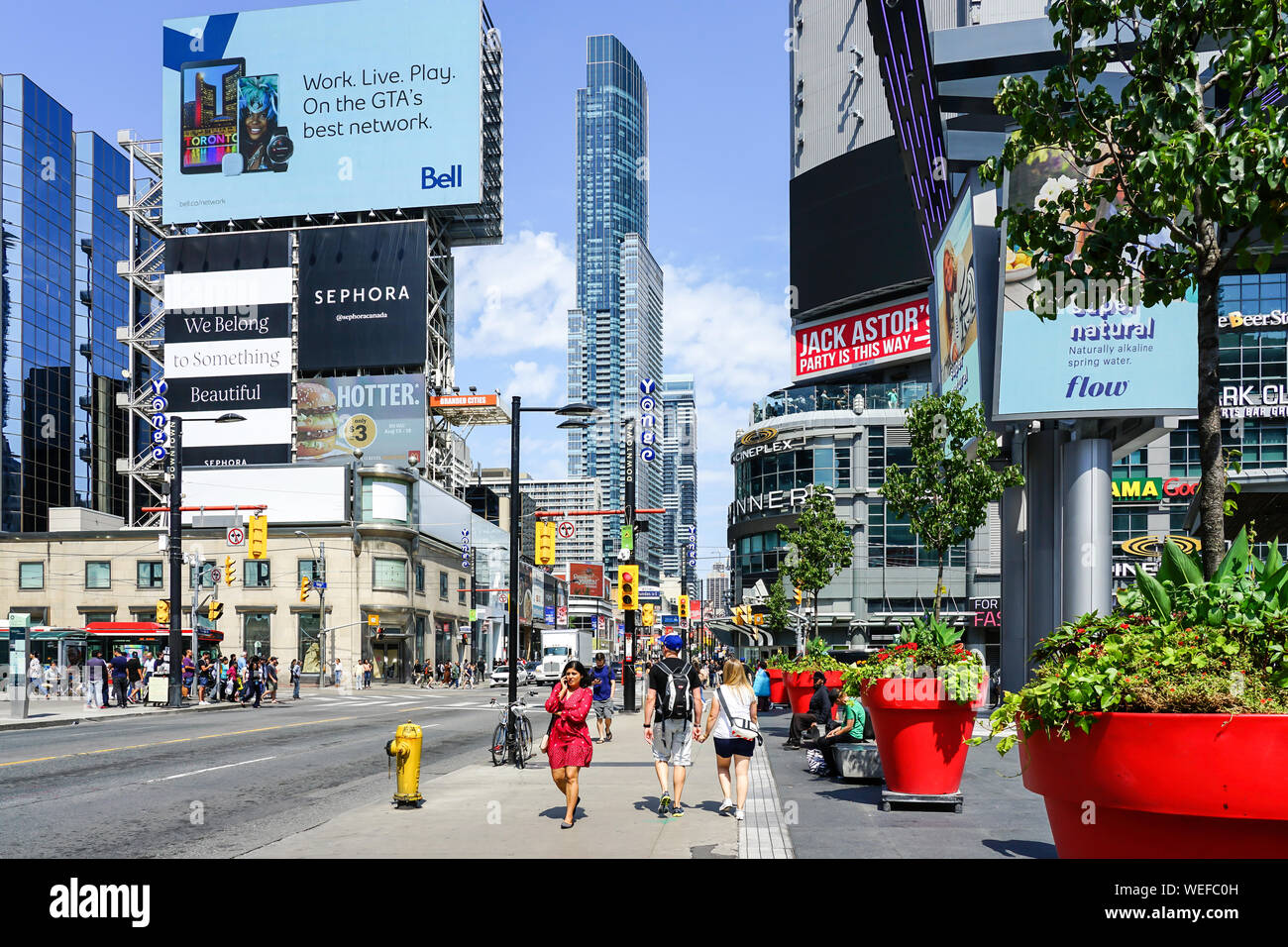 Dundas Square in Toronto, Ontario, Canada, North America, Yonge Street, Dundas Square, Eaton Centre, Convention Centre, Sightseeing bus, tourism, Stock Photo