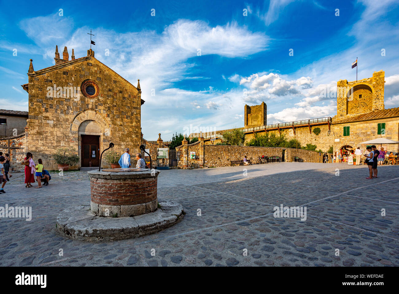 Romanesque-Gothic church of Santa Maria Assunta. Monteriggioni, Tuscany Stock Photo