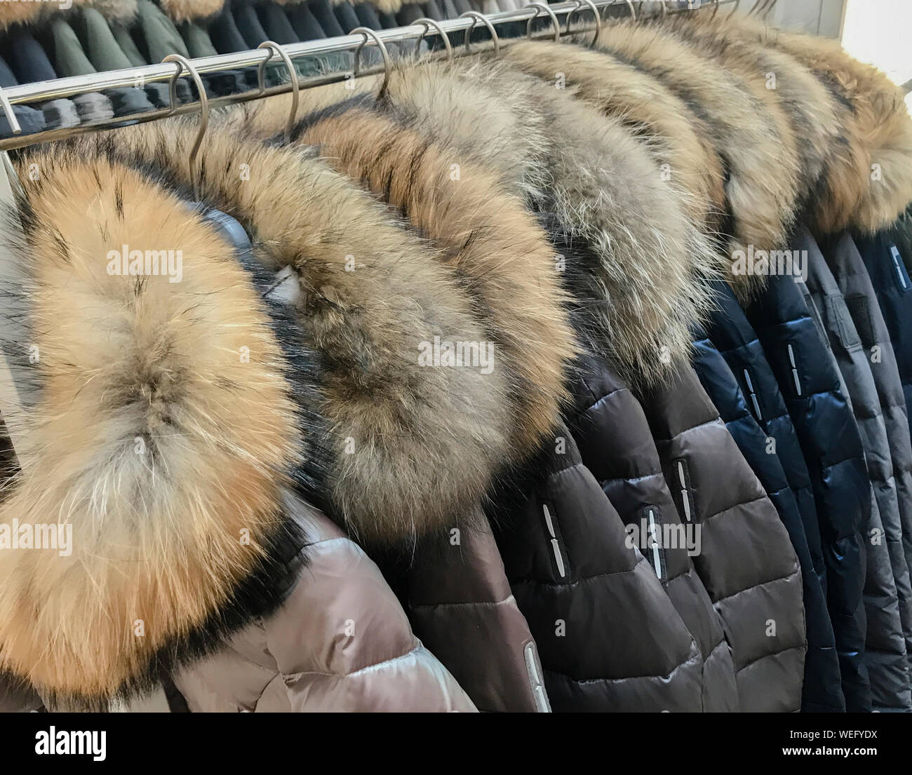 Hanging up fur coat hires stock photography and images Alamy