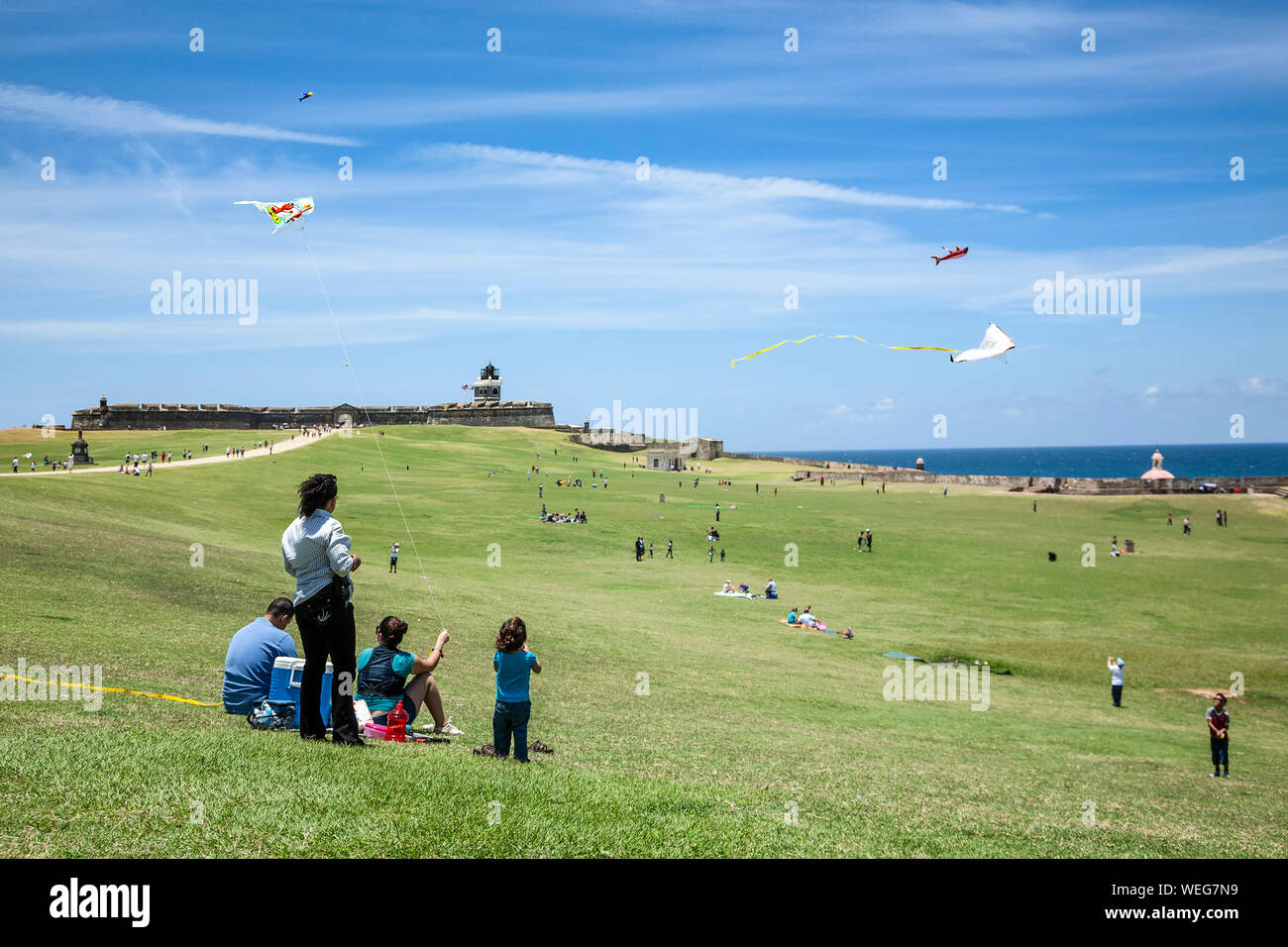 Families flying kites, El Morro grounds, Old San Juan, Puerto Rico
