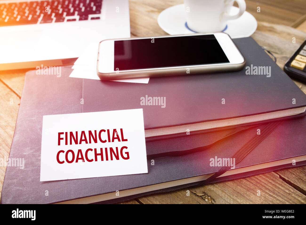 Financial Coaching Text On Paper Over Diary At Desk In Office Stock Photo