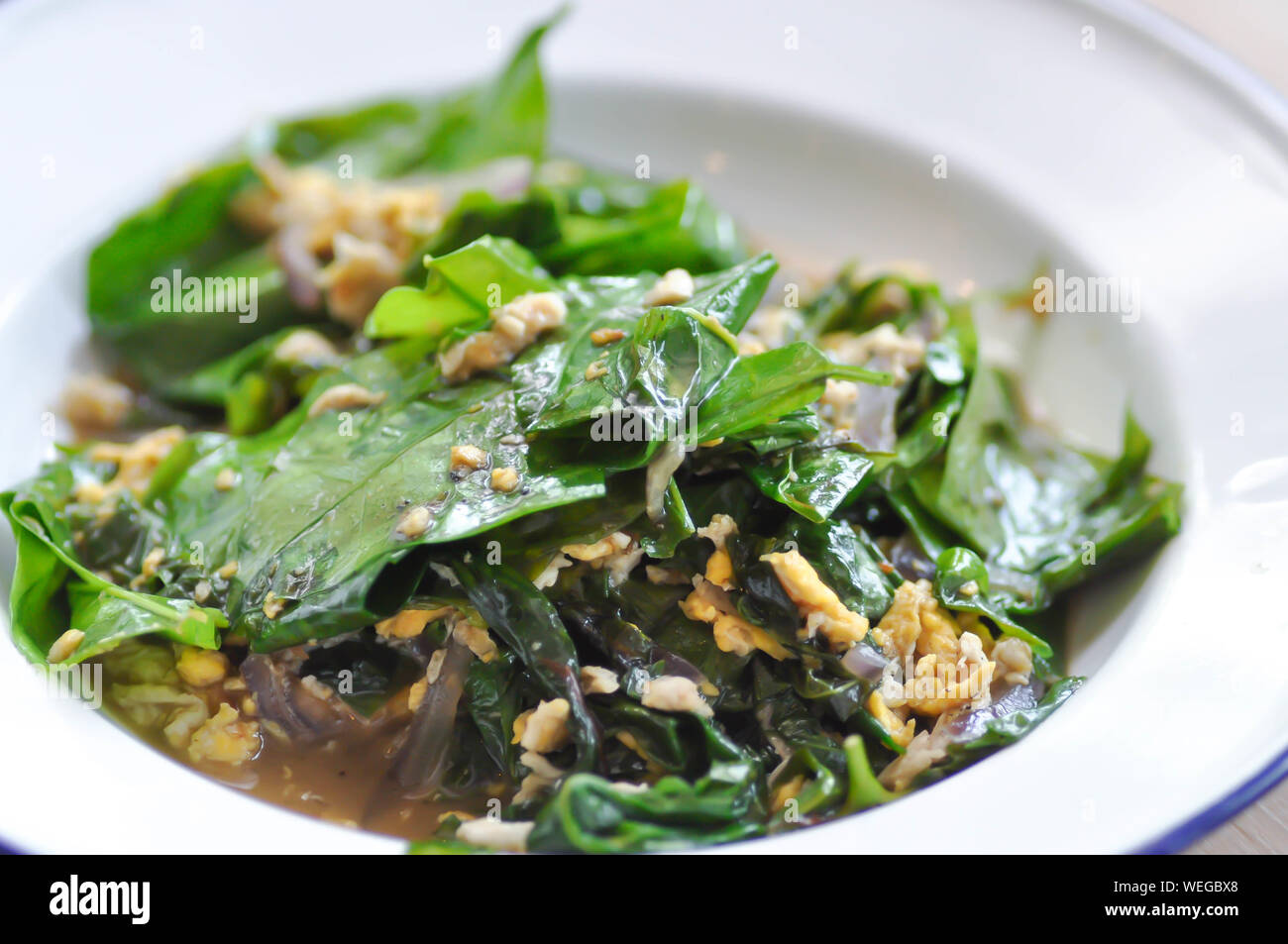stir-fried vegetable or stir-fried baegu with egg, Thai food Stock Photo