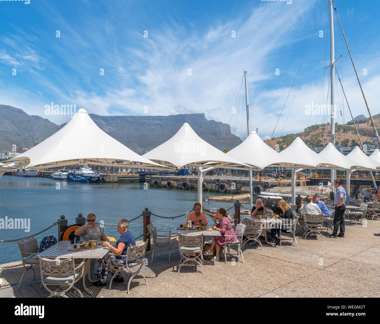 Restaurant at the V&A Waterfront with Table Mountain in the background, Cape Town, Western Cape, South Africa Stock Photo