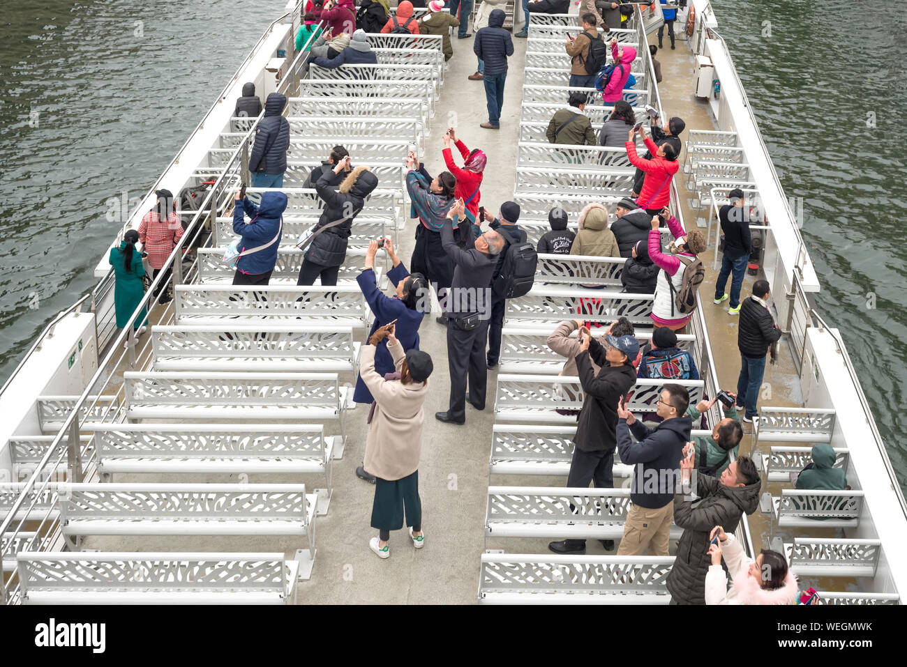 Tourists with cameras on The Seine in Paris, France Stock Photo Alamy