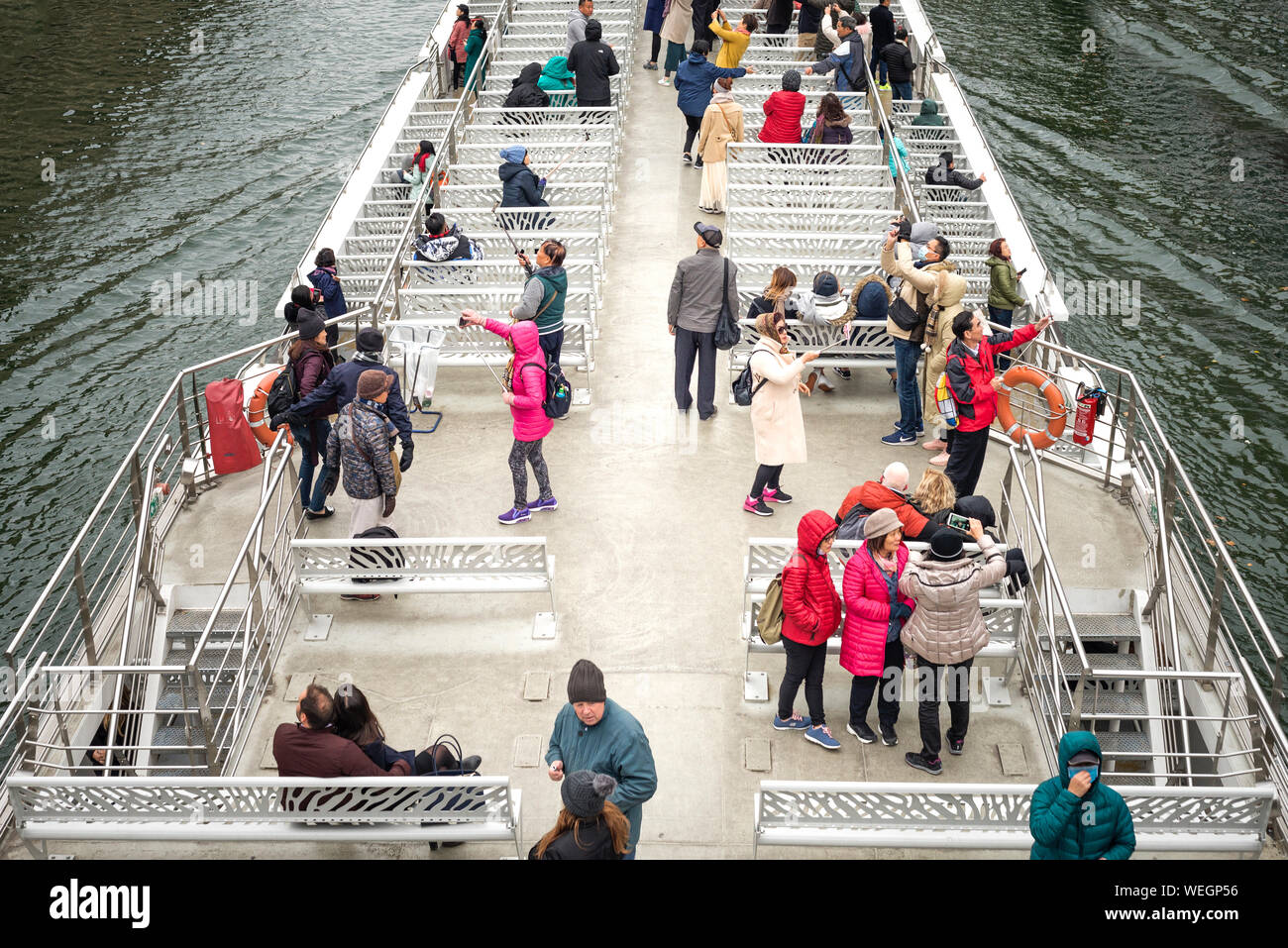 Tourists with cameras on The Seine in Paris, France Stock Photo Alamy