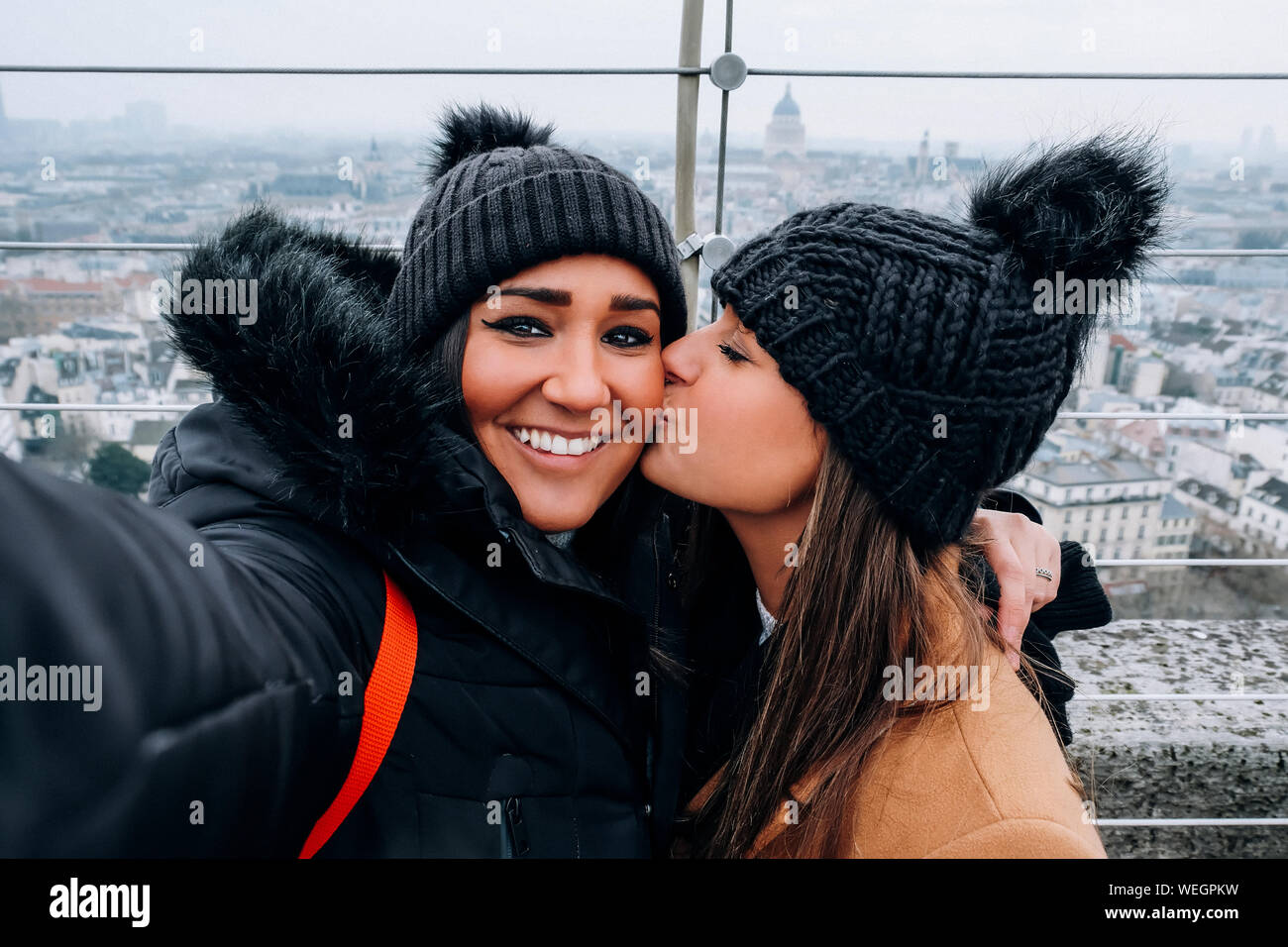 Kissing friend hi-res stock photography and images - Alamy
