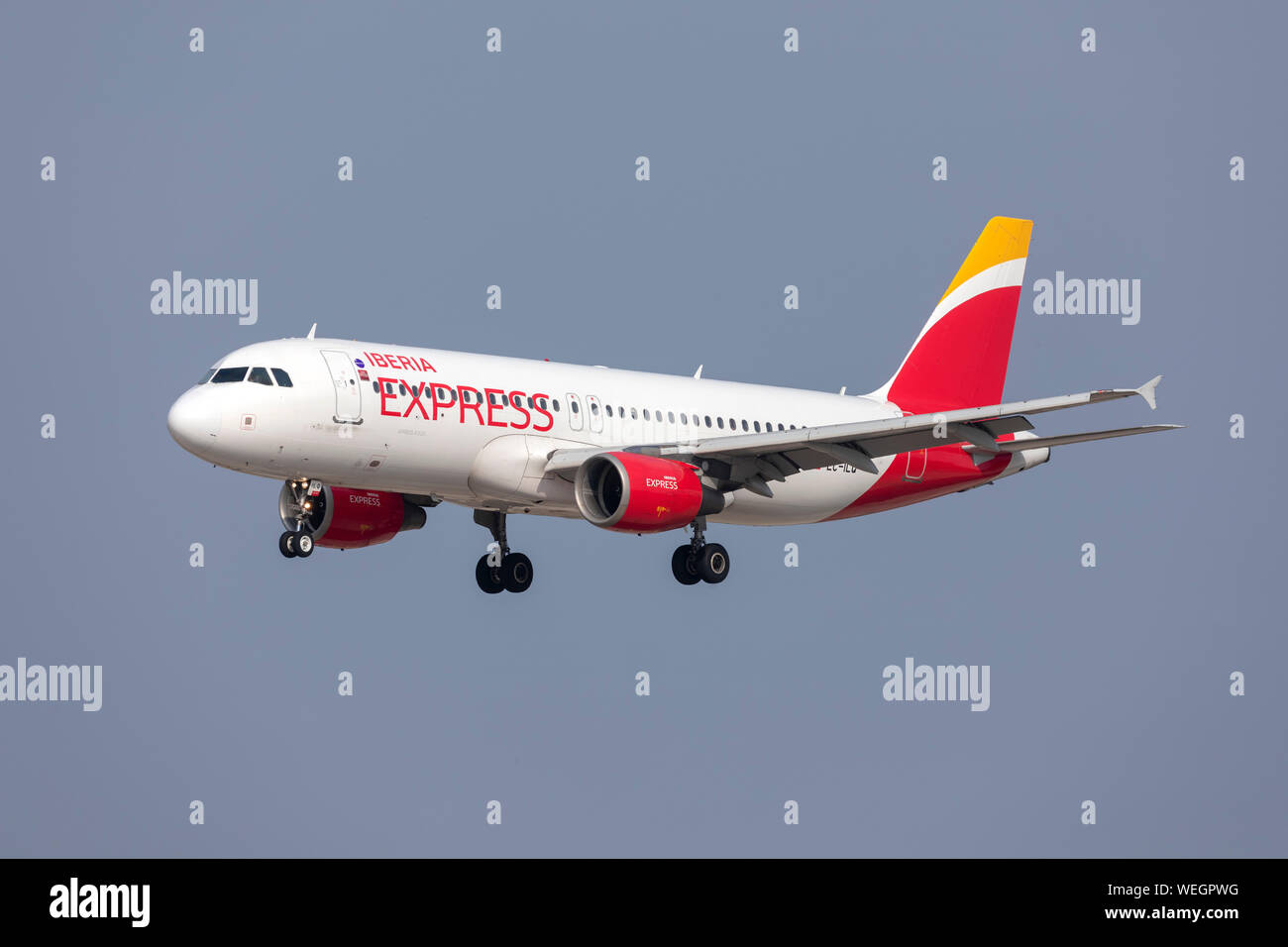 Iberia Express Airbus A320-214 (EC-ILQ) on finals runway 31. Stock Photo