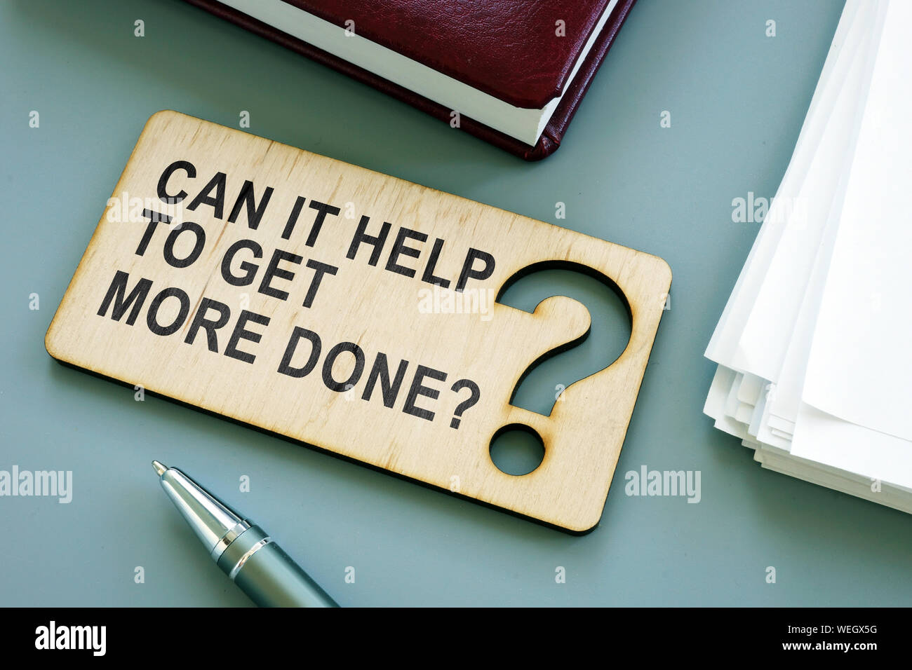 Sign Can it help to get more done on the plank. How to be more productive concept. Stock Photo