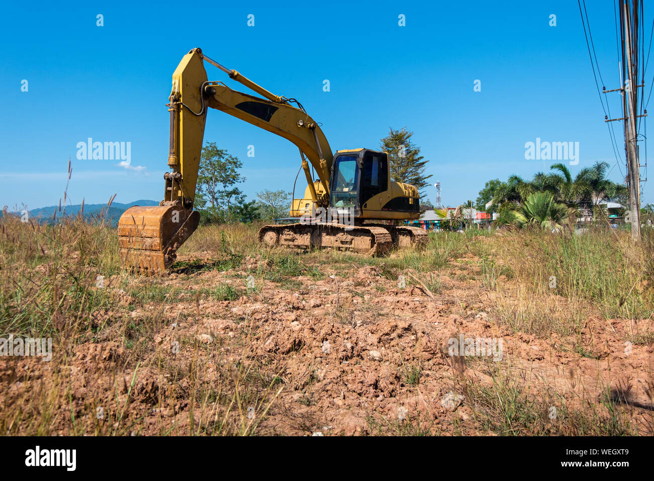 Yellow excavator construction truck Stock Photo