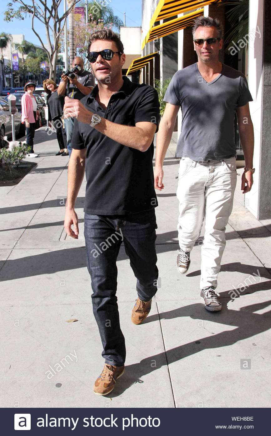 ryan seacrest black and white sneakers