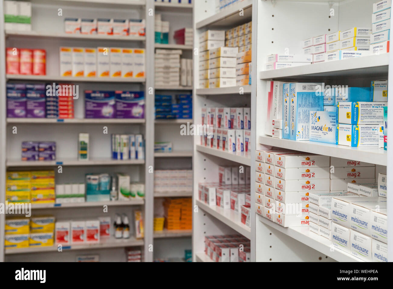 Shelves of medication on sale in a pharmacy Stock Photo - Alamy