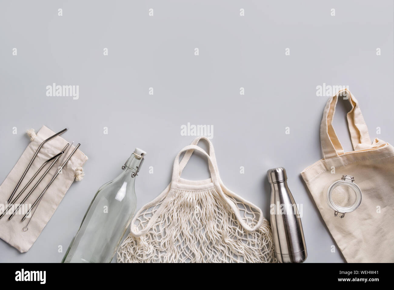 Reusable glass and metal bottle, mesh bag for zero waste lifestyle on ...