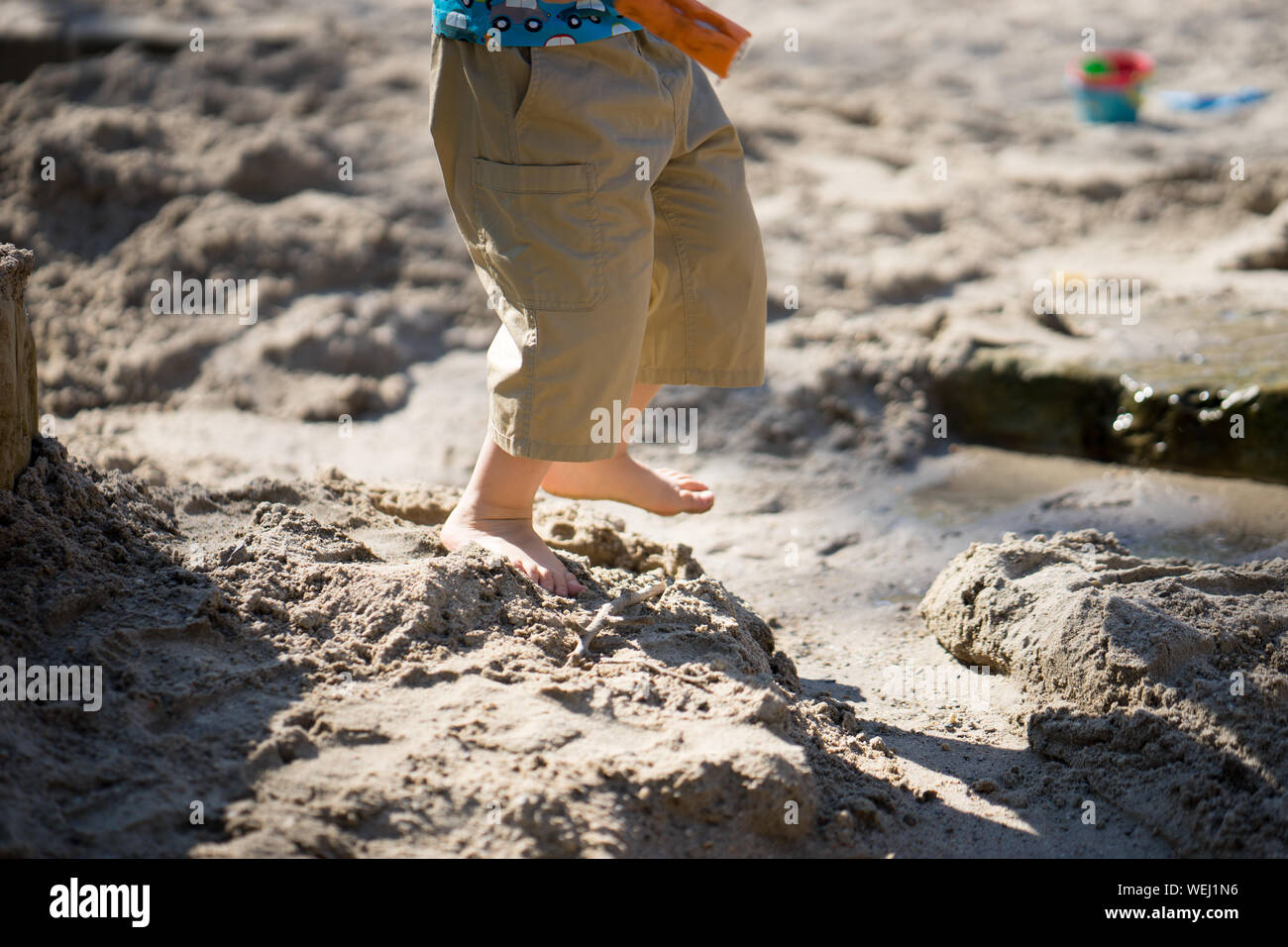 Barefoot Child On Beach Stock Photo