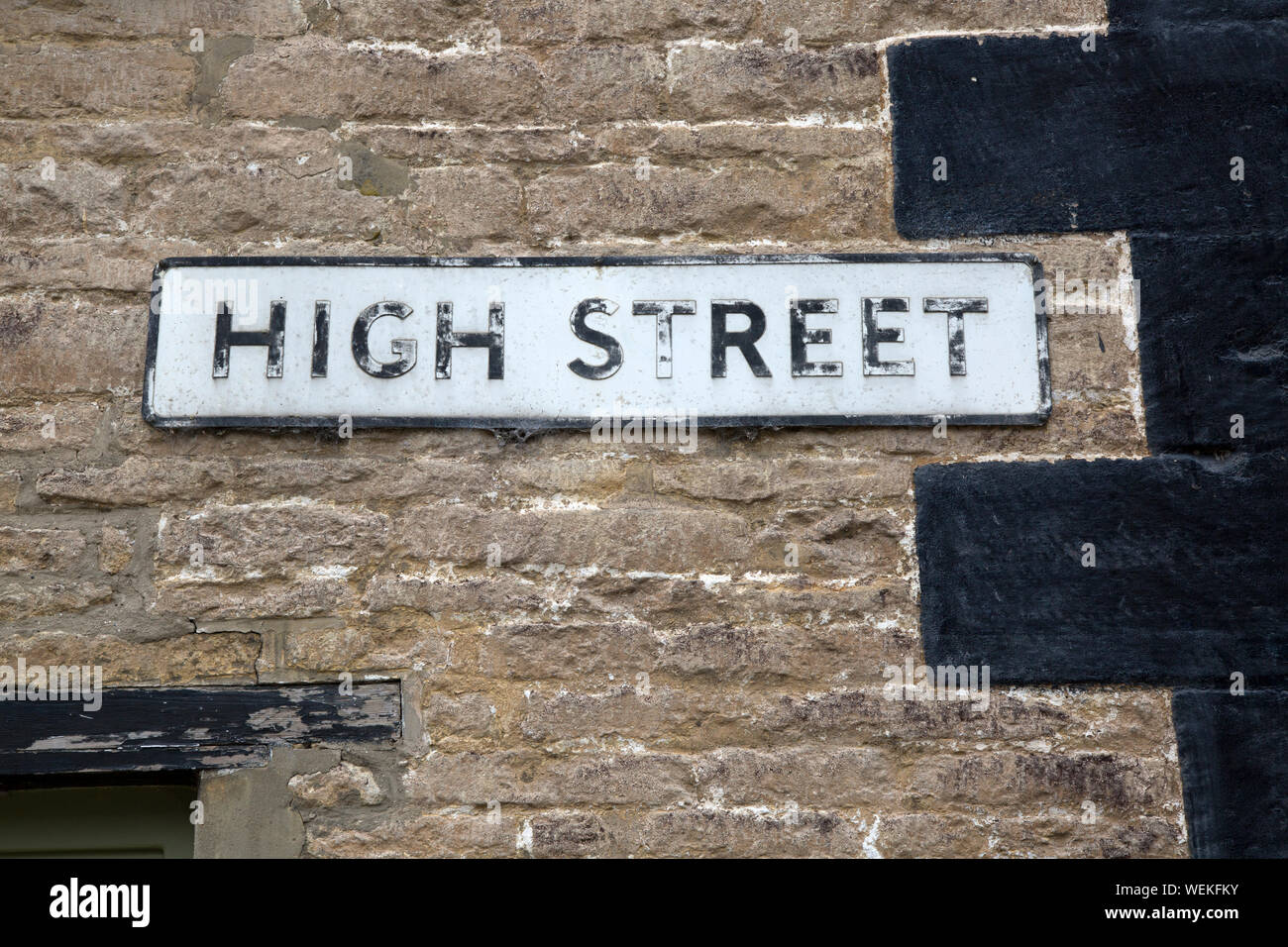 High Street Sign on Stone Wall Stock Photo Alamy
