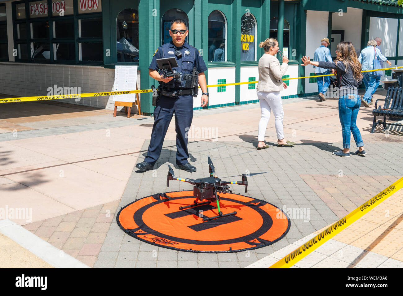August 29, 2019 Sunnyvale / CA / USA - Police officer presenting the drone program at the 'Technology Business Expo'; The Police Department has starte Stock Photo