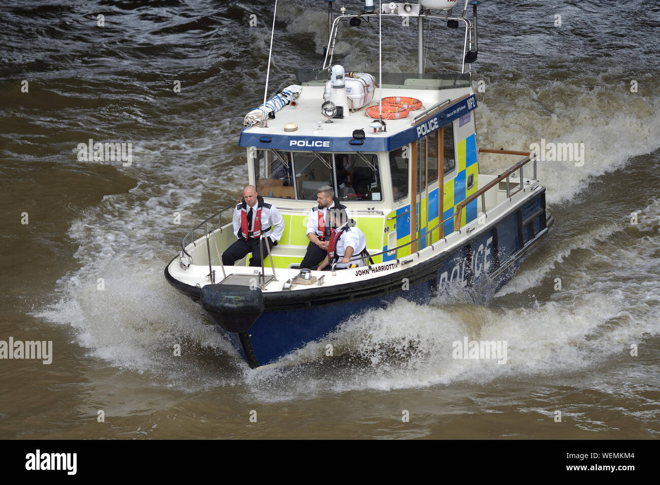 London, England, UK. Metropolitan River Police on board the Marine Policing Unit boat John Harriott IV on the Thames Stock Photo