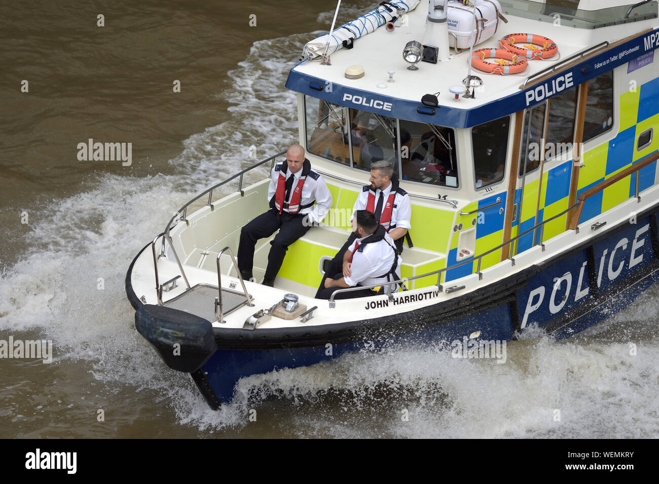 London, England, UK. Metropolitan River Police on board the Marine Policing Unit boat John Harriott IV on the Thames Stock Photo
