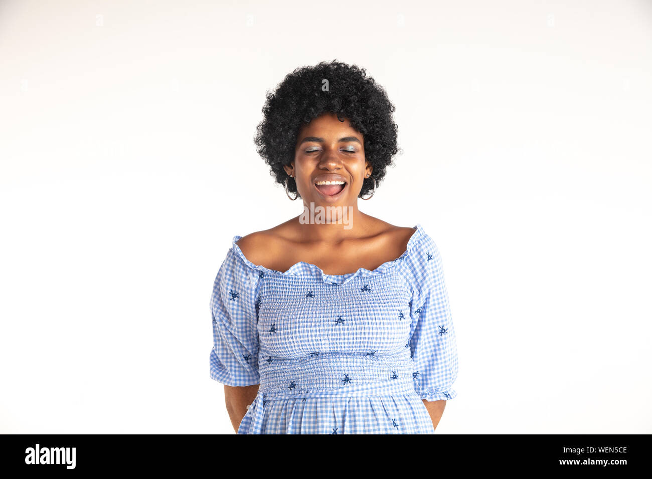 Beautiful Female Half Length Portrait On White Studio Background