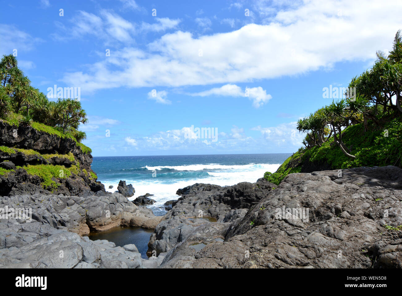 Volcanic rock beach in remote areas of an island Stock Photo
