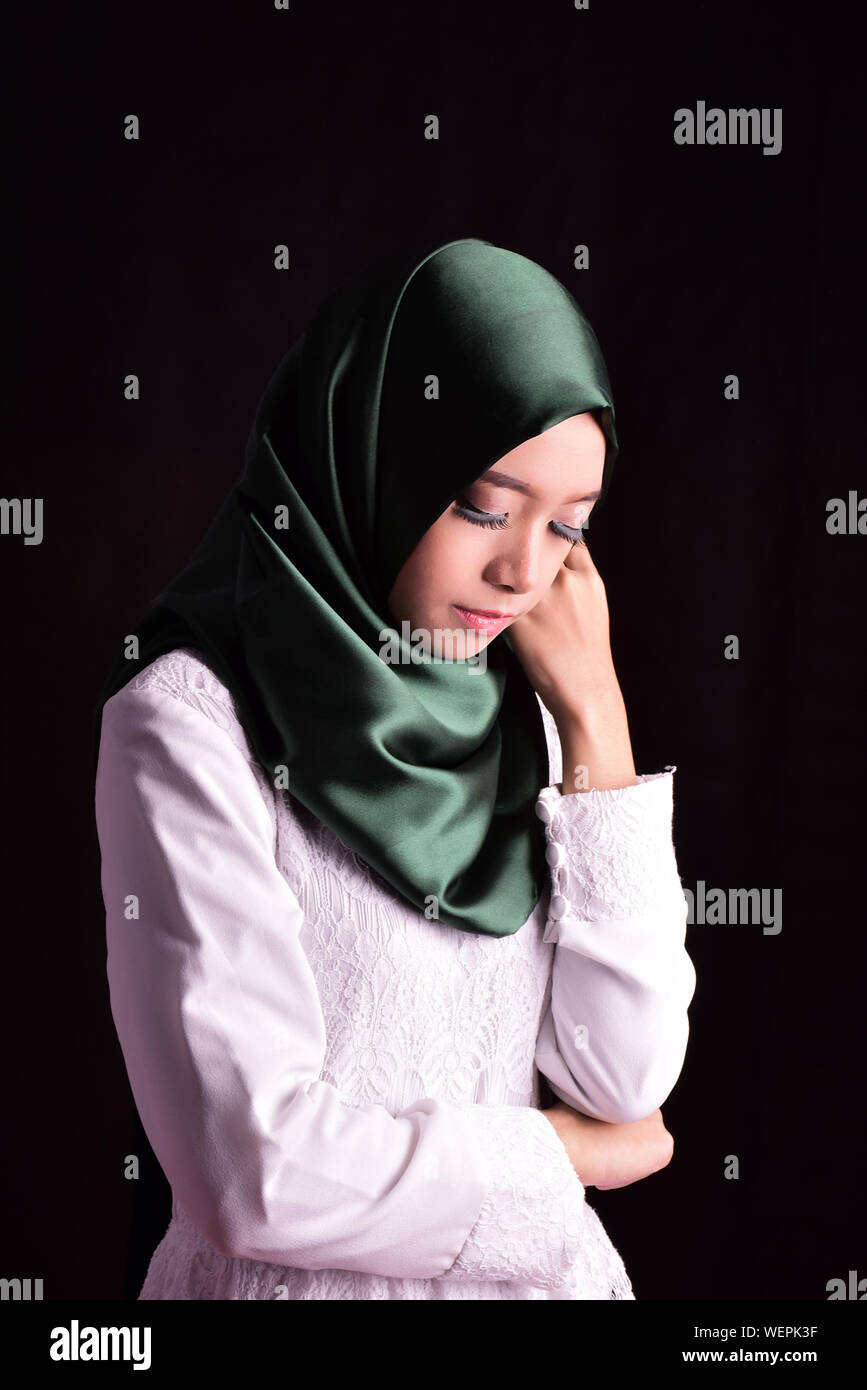 Young Woman In Hijab Against Black Background Stock Photo - Alamy