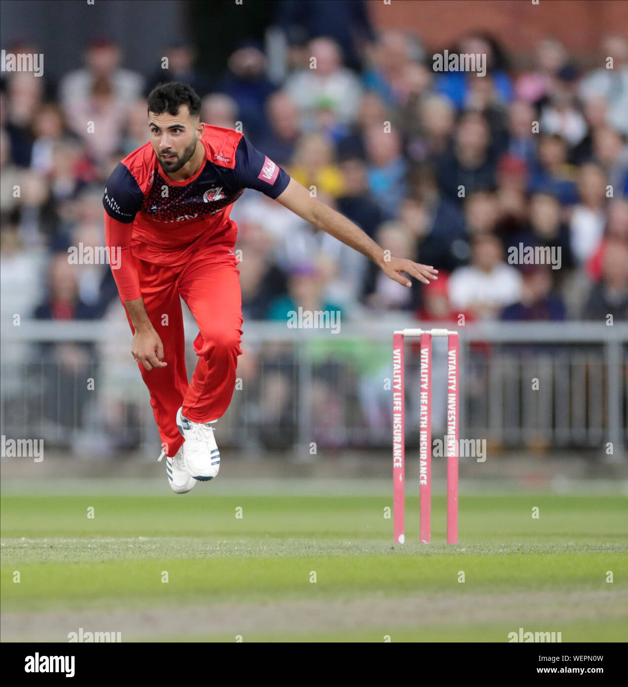 Manchester, UK. 30th August 2019; Emirates Old Trafford, Manchester, England; T20 Vitality Blast, Lancashire Lightning versus Leicestershire Foxes; Saqib Mahmood bowling for Lancs - Editorial Use Only Credit: Action Plus Sports Images/Alamy Live News Stock Photo