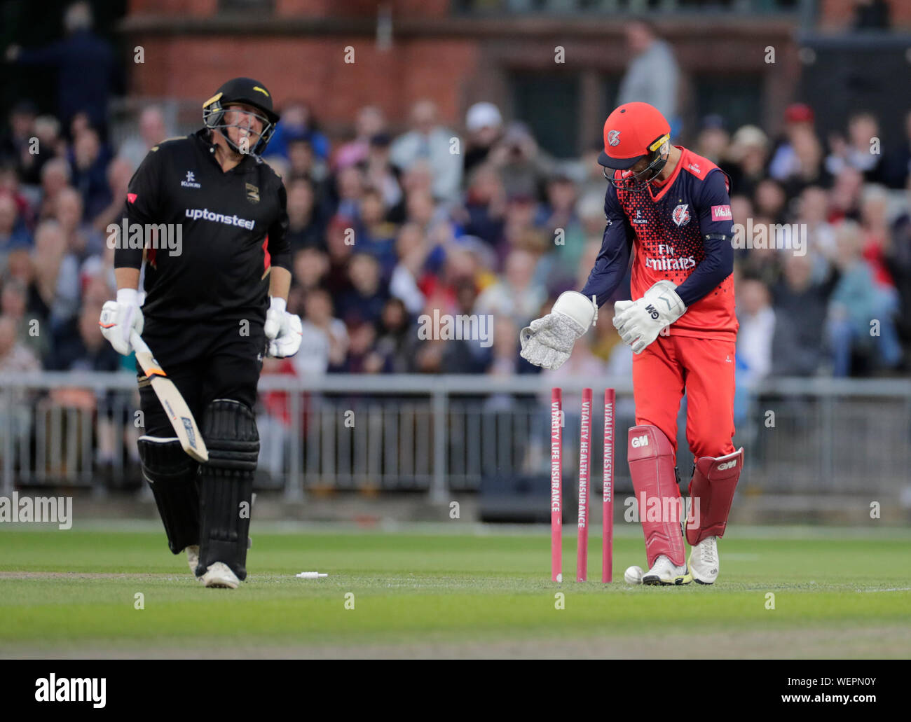 Manchester, UK. 30th August 2019; Emirates Old Trafford, Manchester, England; T20 Vitality Blast, Lancashire Lightning versus Leicestershire Foxes; Mark Cosgrove grimaces after being bowled for 39 off the bowling of Steven Croft - Editorial Use Only Credit: Action Plus Sports Images/Alamy Live News Stock Photo