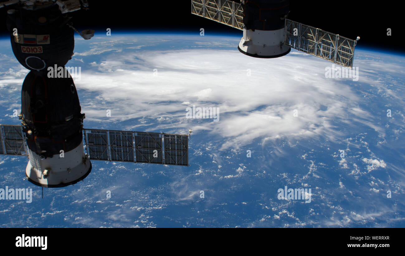 International Space Station, USA. 29 August 2019. The cyclonic clouds of Hurricane Dorian seen from the International Space Station as it churns through the Caribbean August 29, 2019 in the Atlantic Ocean. The current forecast calls for Dorian to strengthen over open water to a Category 4 with winds of 140 mph before making landfall in South Florida late Monday.  Credit: NASA/Planetpix/Alamy Live News Stock Photo