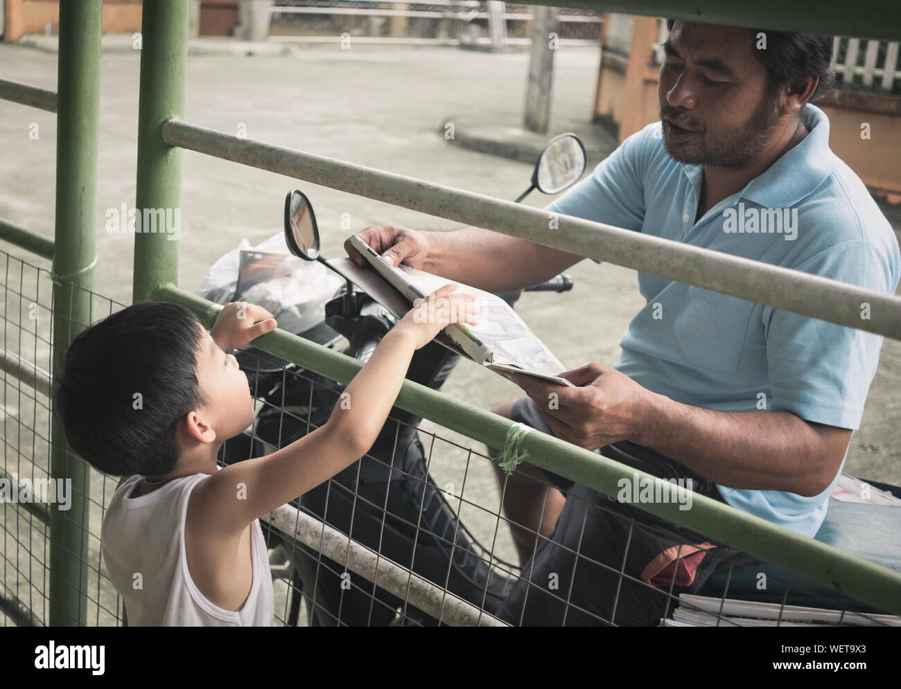 Newspaper delivery boy hires stock photography and images Alamy