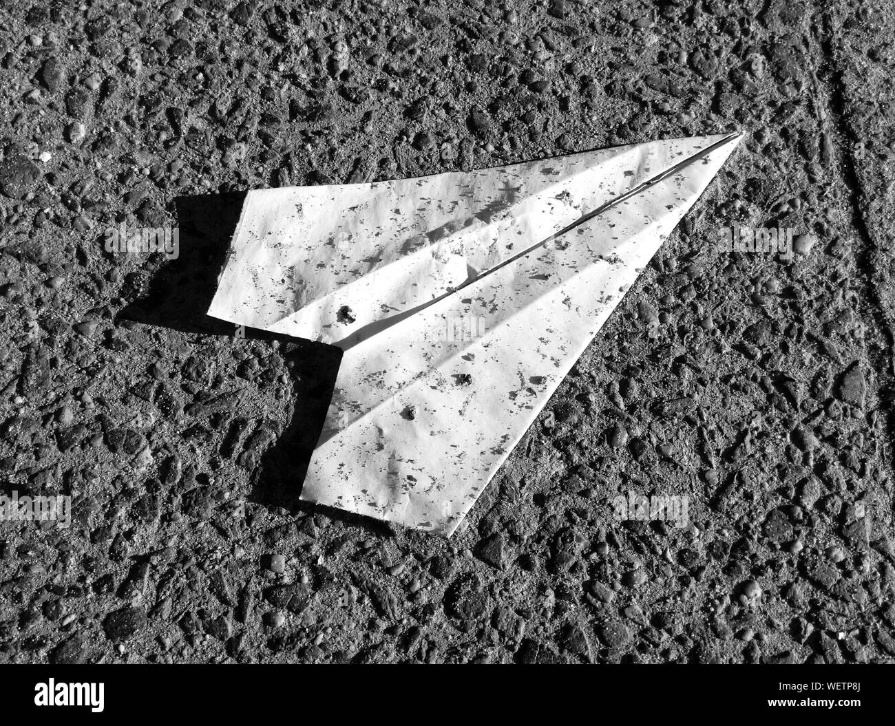 Download High Angle View Of Paper Plane On Footpath Stock Photo Alamy Yellowimages Mockups