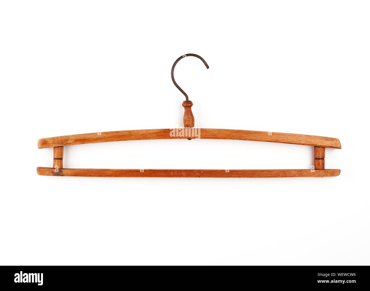 wooden vintage clothes hanger on a white background, iron hook Stock Photo