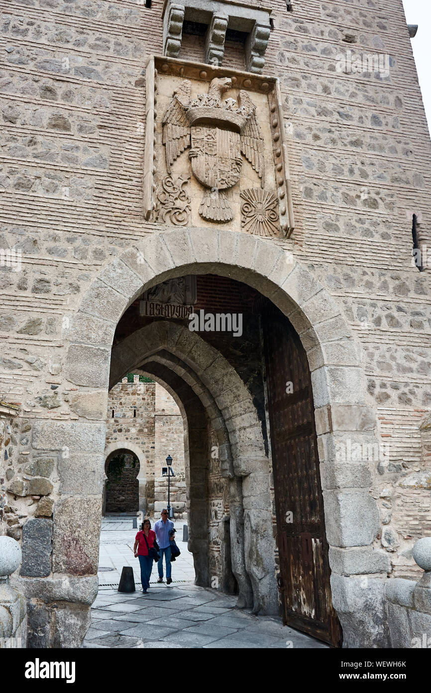 TOLEDO, SPAIN - APRIL 24, 2018: Details and coat of arms of the tower at the Alcantara bridge in Toledo. Stock Photo