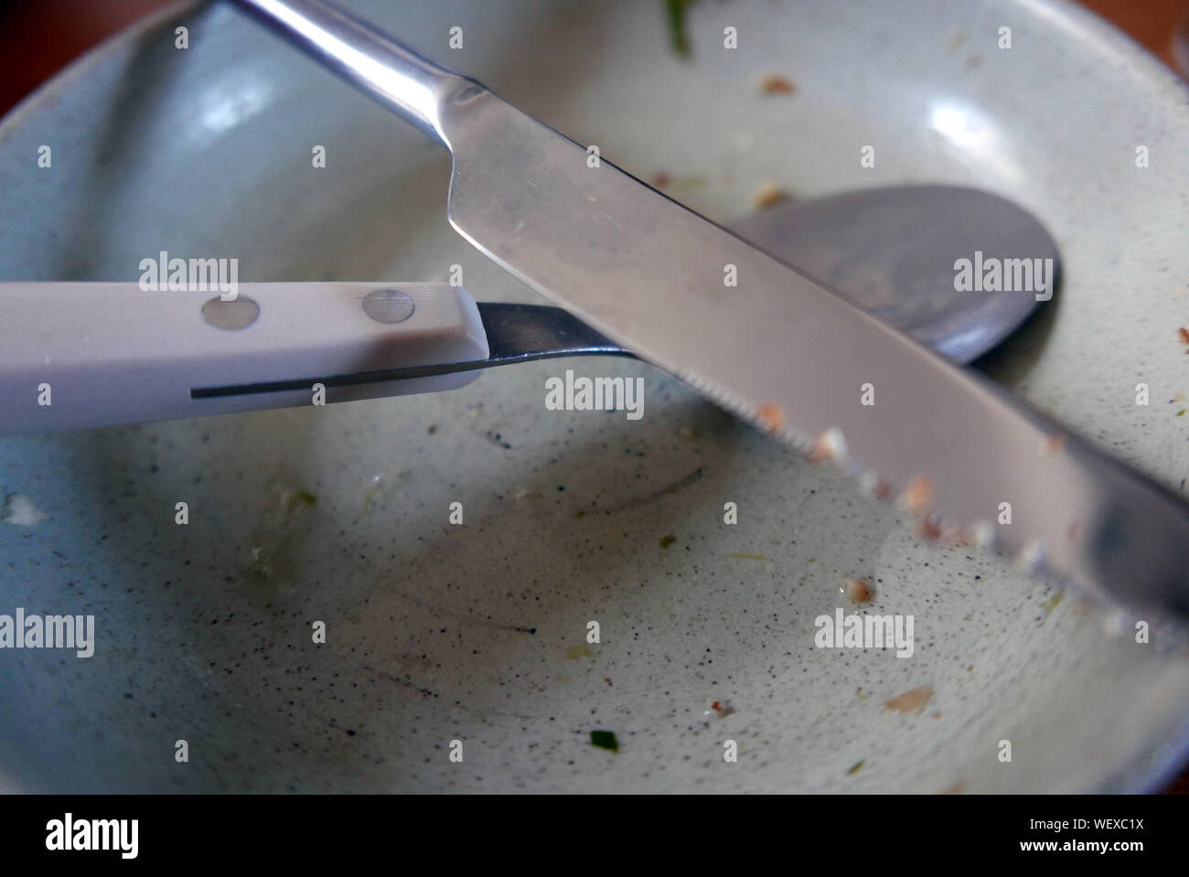 Close-up Of Silverware In Plate Stock Photo