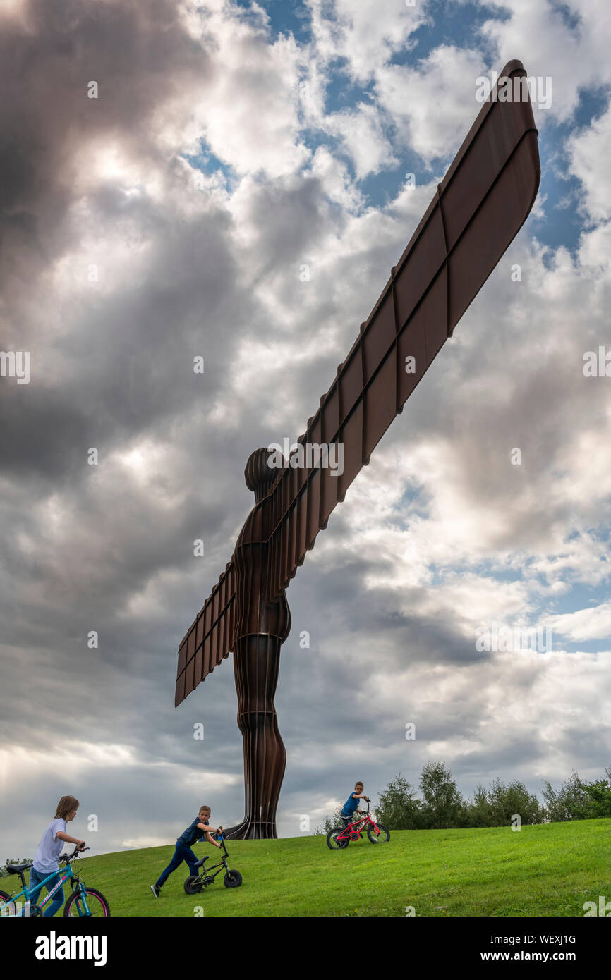 The Angel of the North is a contemporary steel sculpture located on a hill at Low Eighton in Gateshead, Tyne and Wear. It was designed by Antony Gorml Stock Photo