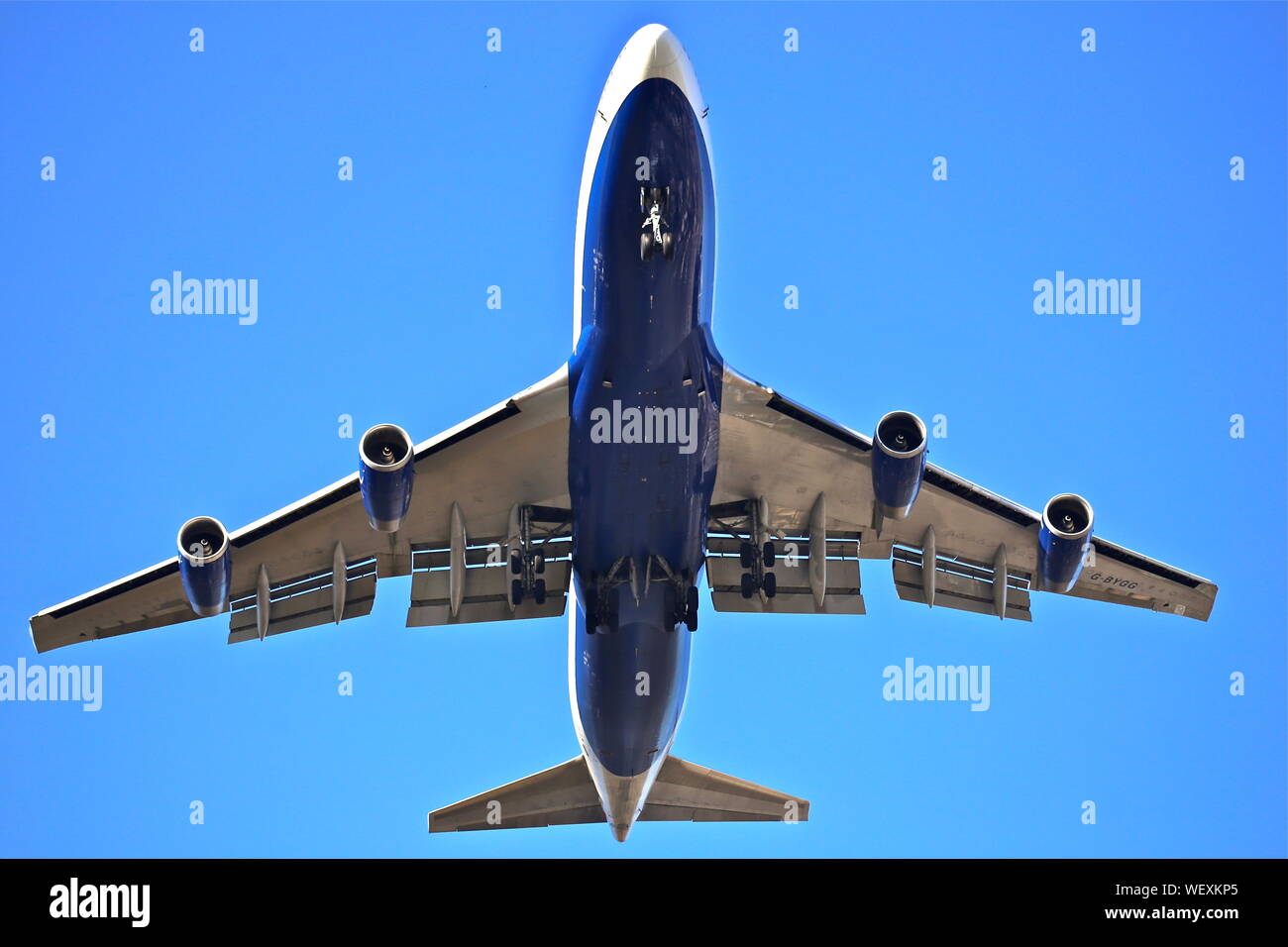 A British Airways Boeing 747 on final approach with its wheels down ...
