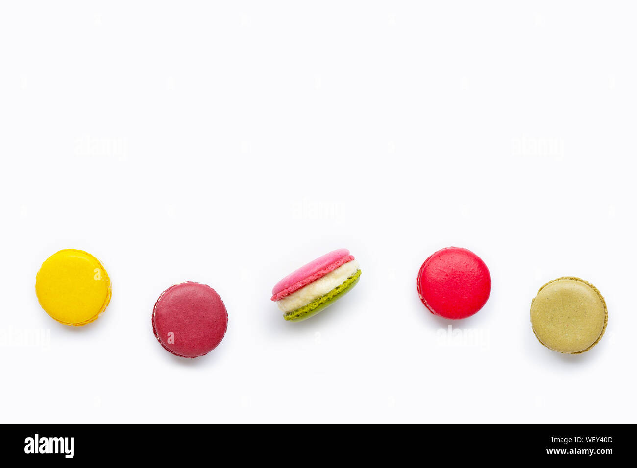 Colorful macarons isolated on white background. Stock Photo